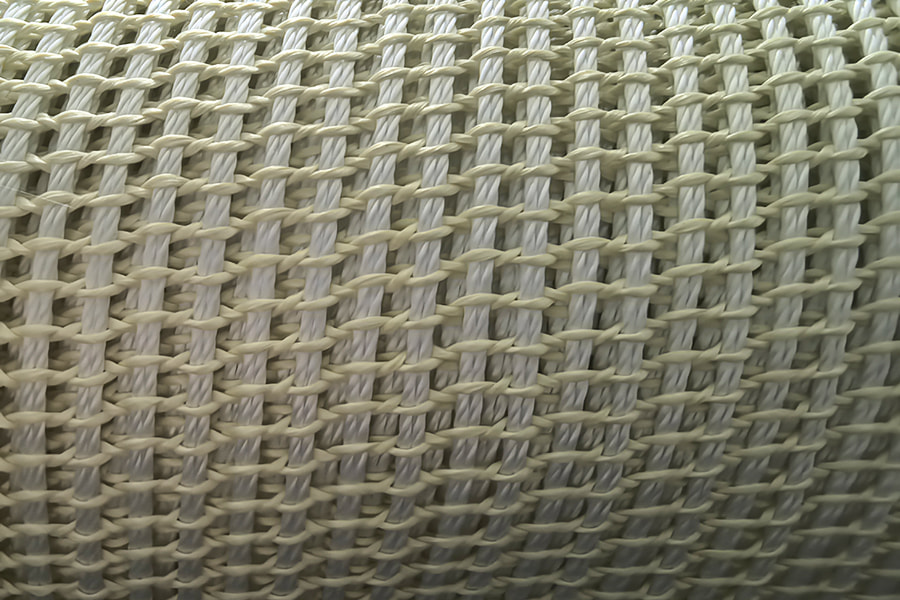 Rolă de țesătură cu plasă armată cu aramid de înaltă rezistență – pentru materiale de bază compozite Rolă de țesătură cu plasă armată cu aramid de înaltă rezistență – pentru materiale de bază compozite
