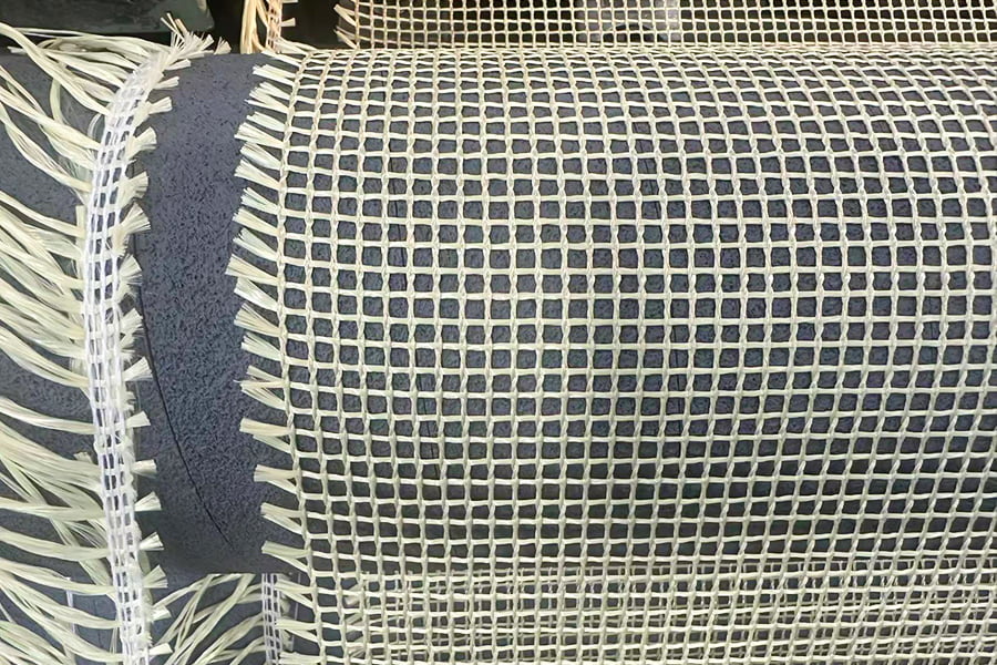 Rolă de țesătură cu plasă armată cu aramid de înaltă rezistență – pentru materiale de bază compozite Rolă de țesătură cu plasă armată cu aramid de înaltă rezistență – pentru materiale de bază compozite